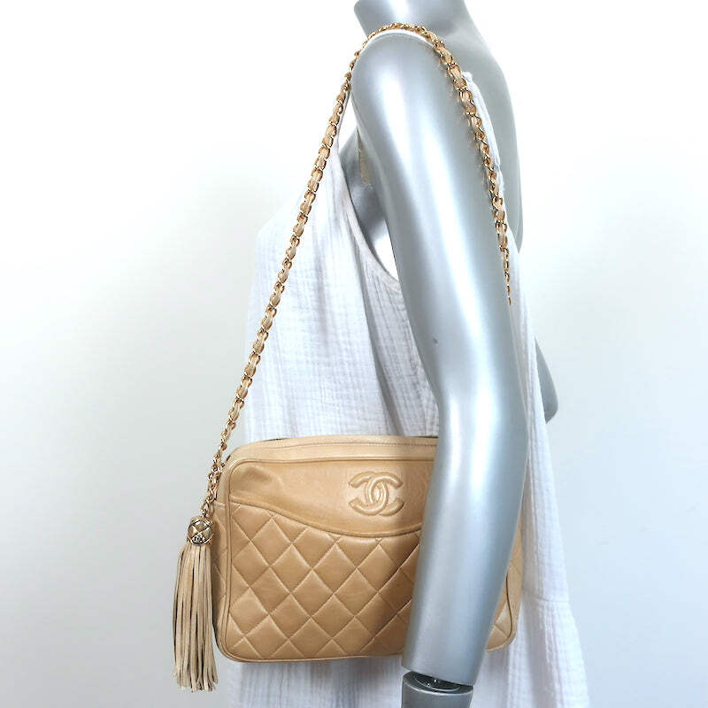 Vintage chanel purse with on sale tassel