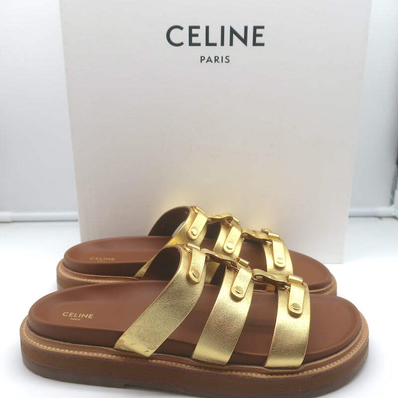 サンダル・ミュール CELINE Leather tippi triomphe sandals Celine Tippi Triomphe Slide Sandals Gold Metallic Leather