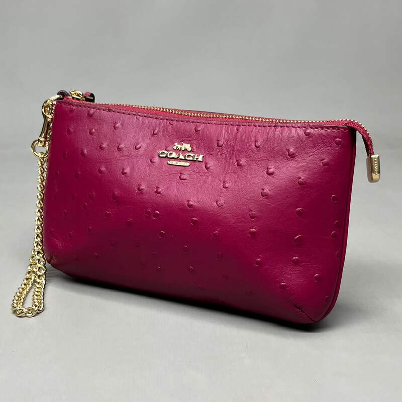 Coach pink hot sale wristlet wallet