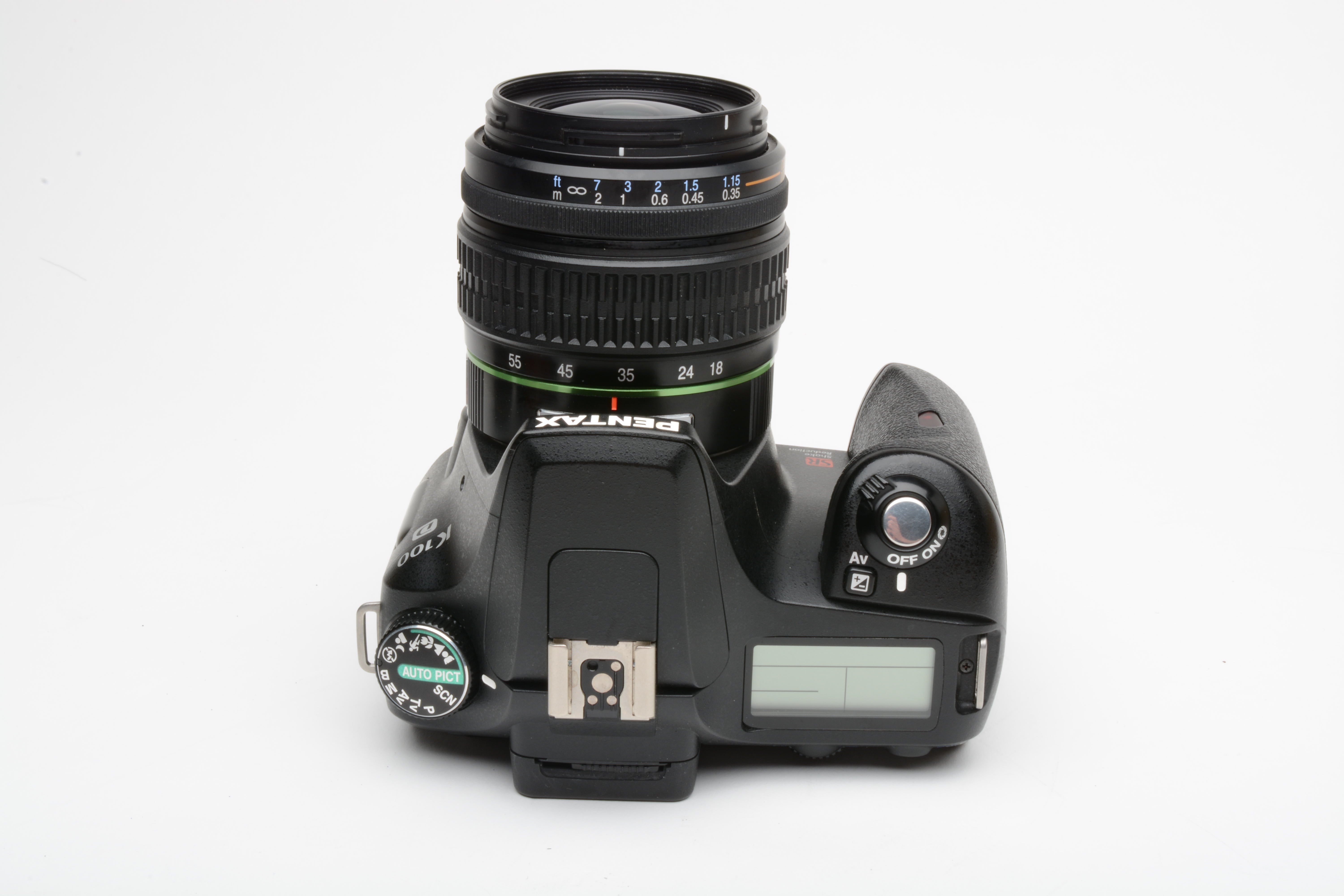 Pentax K100D DSLR w/18-55mm f3.5-5.6 zoom, manuals, book, strap