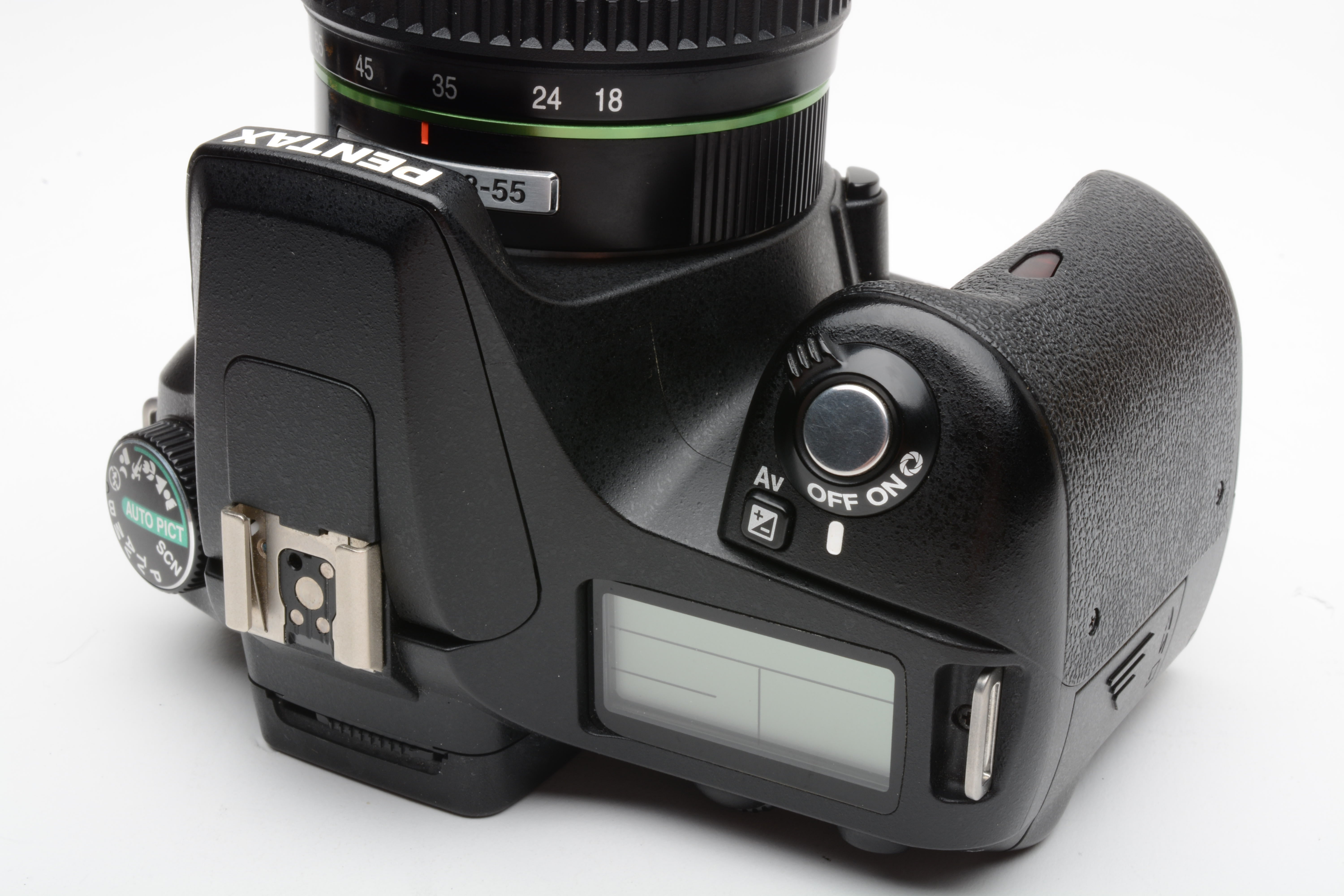 Pentax K100D DSLR w/18-55mm f3.5-5.6 zoom, manuals, book, strap