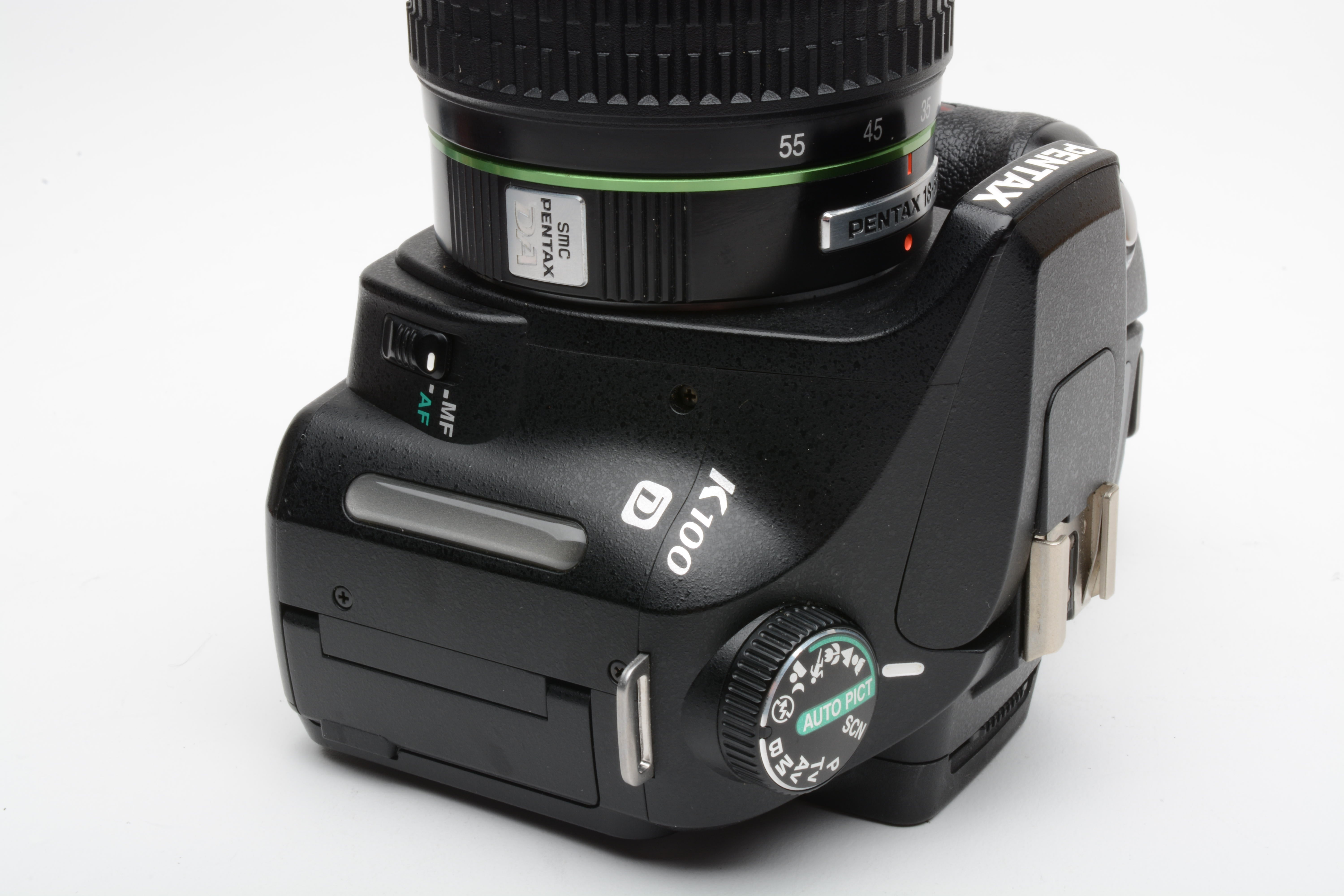 Pentax K100D DSLR w/18-55mm f3.5-5.6 zoom, manuals, book, strap