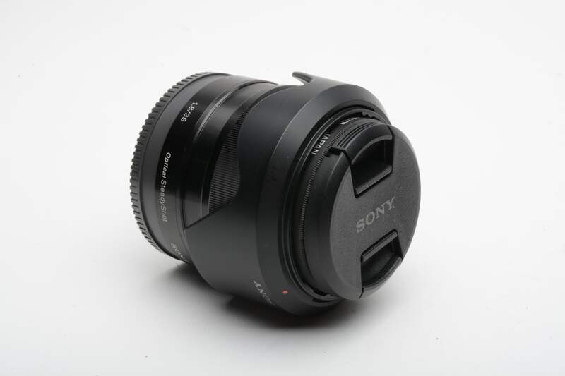 Sony 35mm f1.8 SEL35F18 wide angle E-mount lens, caps, hood, UV