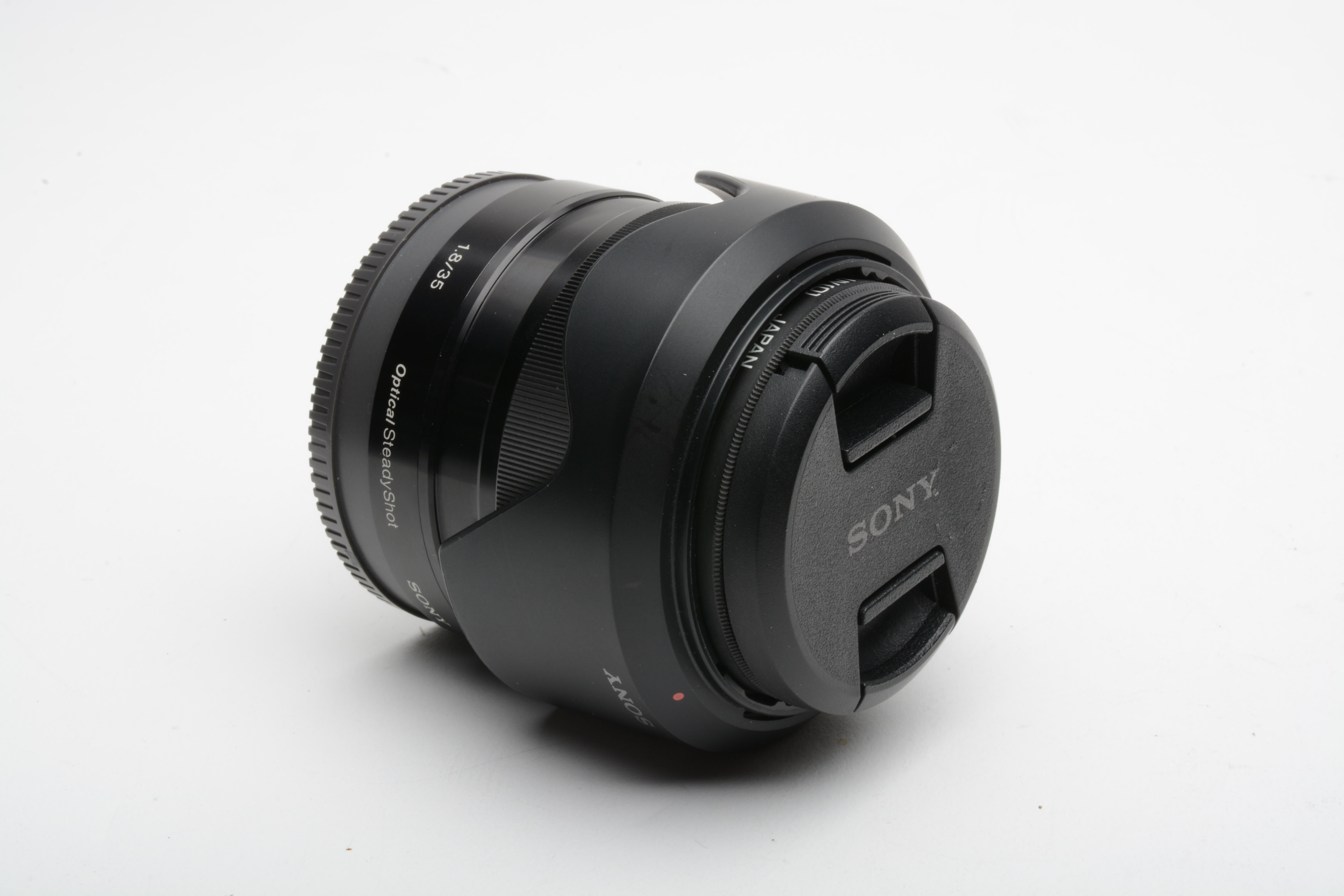 Sony 35mm f1.8 SEL35F18 wide angle E-mount lens, caps, hood, UV