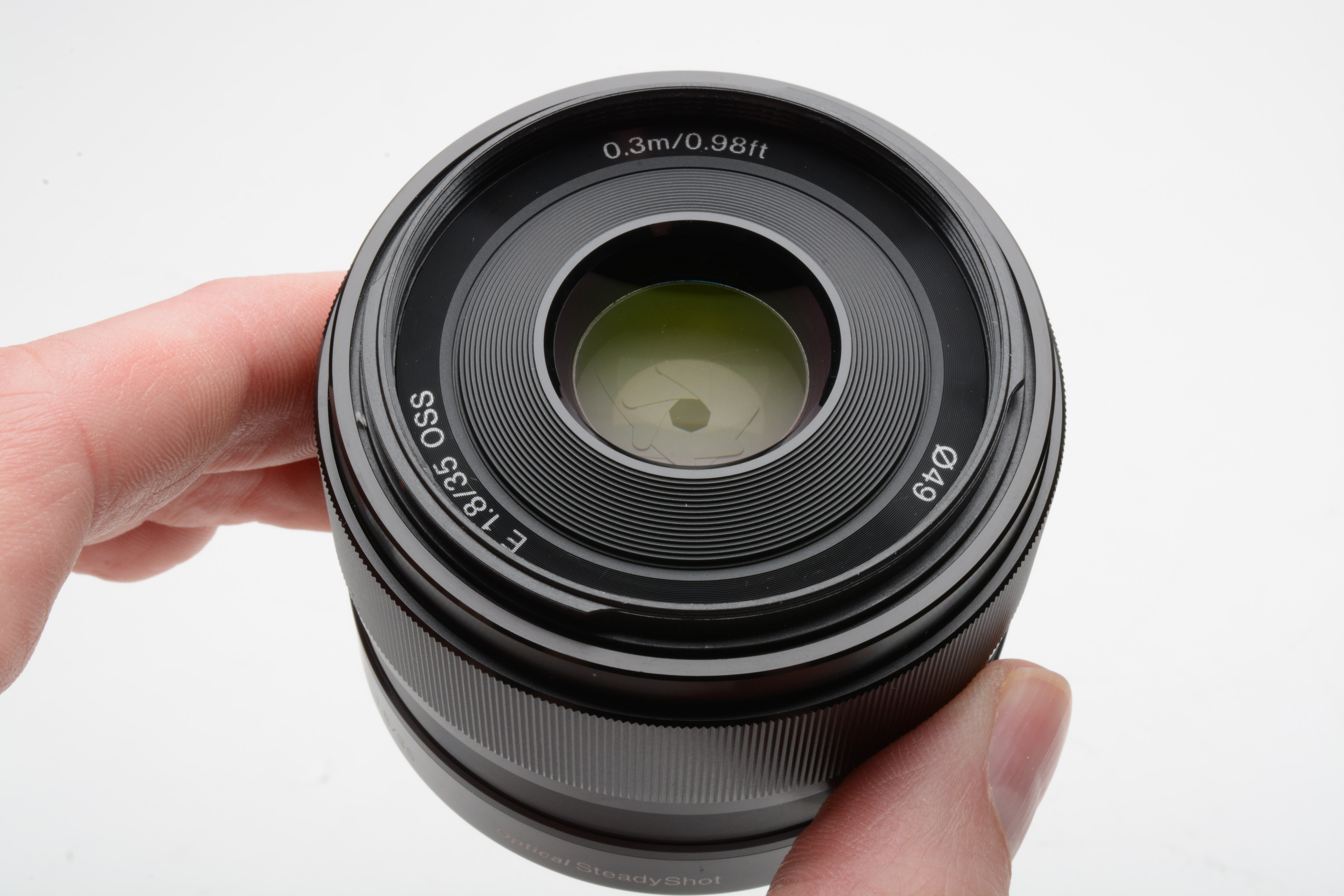 Sony 35mm f1.8 SEL35F18 wide angle E-mount lens, caps, hood, UV
