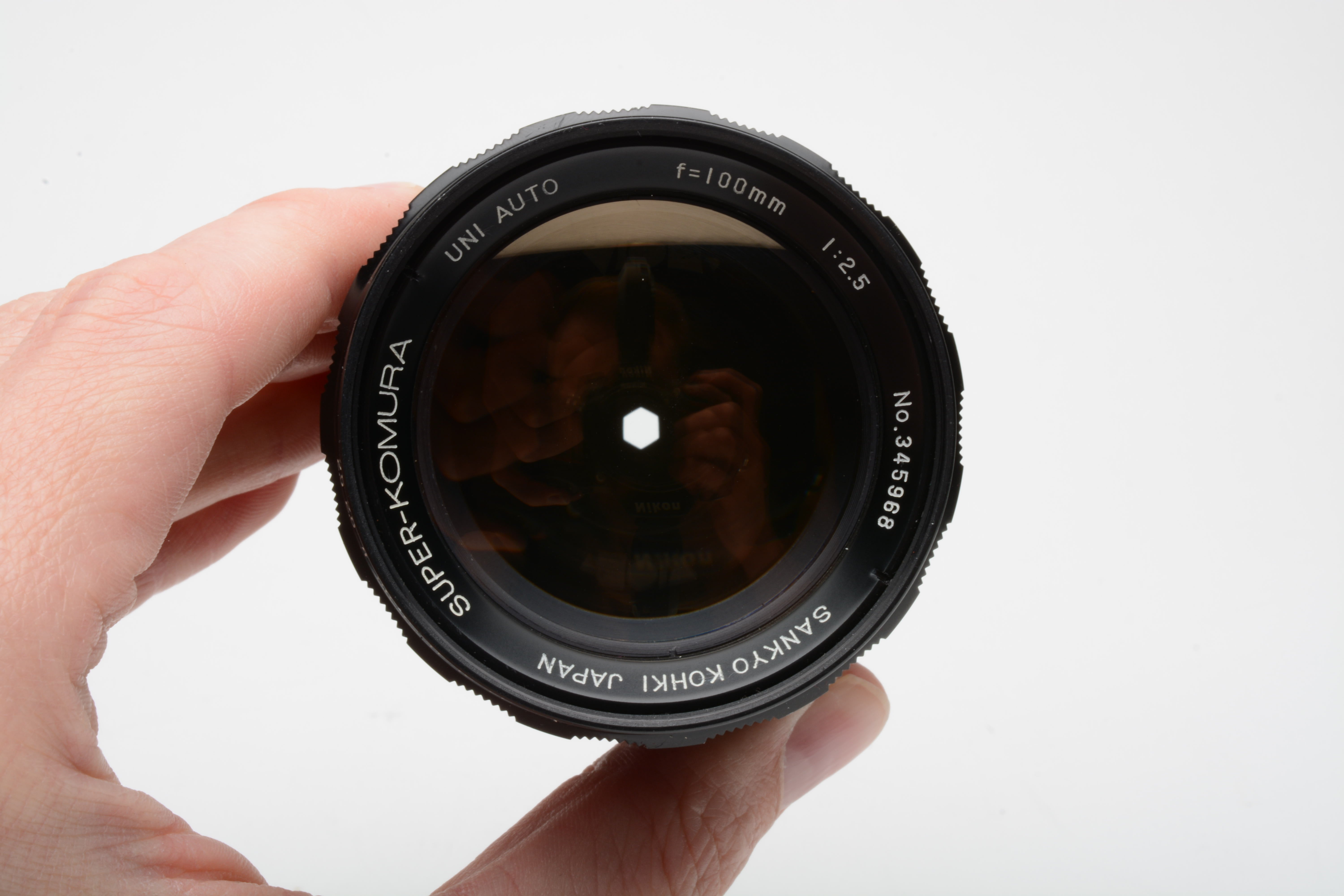 Sankyo Kohki Super Komura 100mm f2.5 lens Nikon F mount, clean