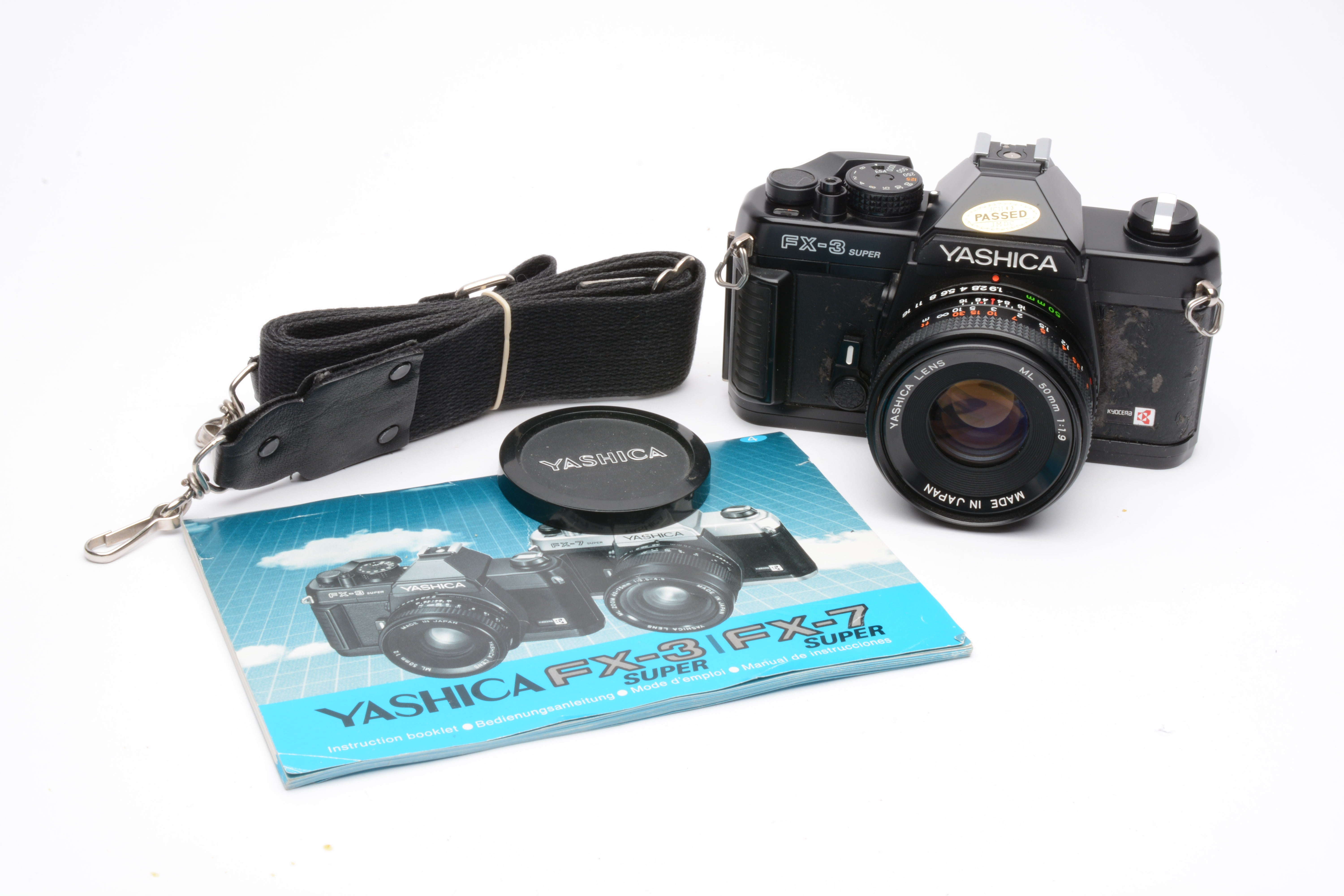 Yashica FX-3 35mm SLR w/50mm F1.9 ML lens, manual, cap, new seals