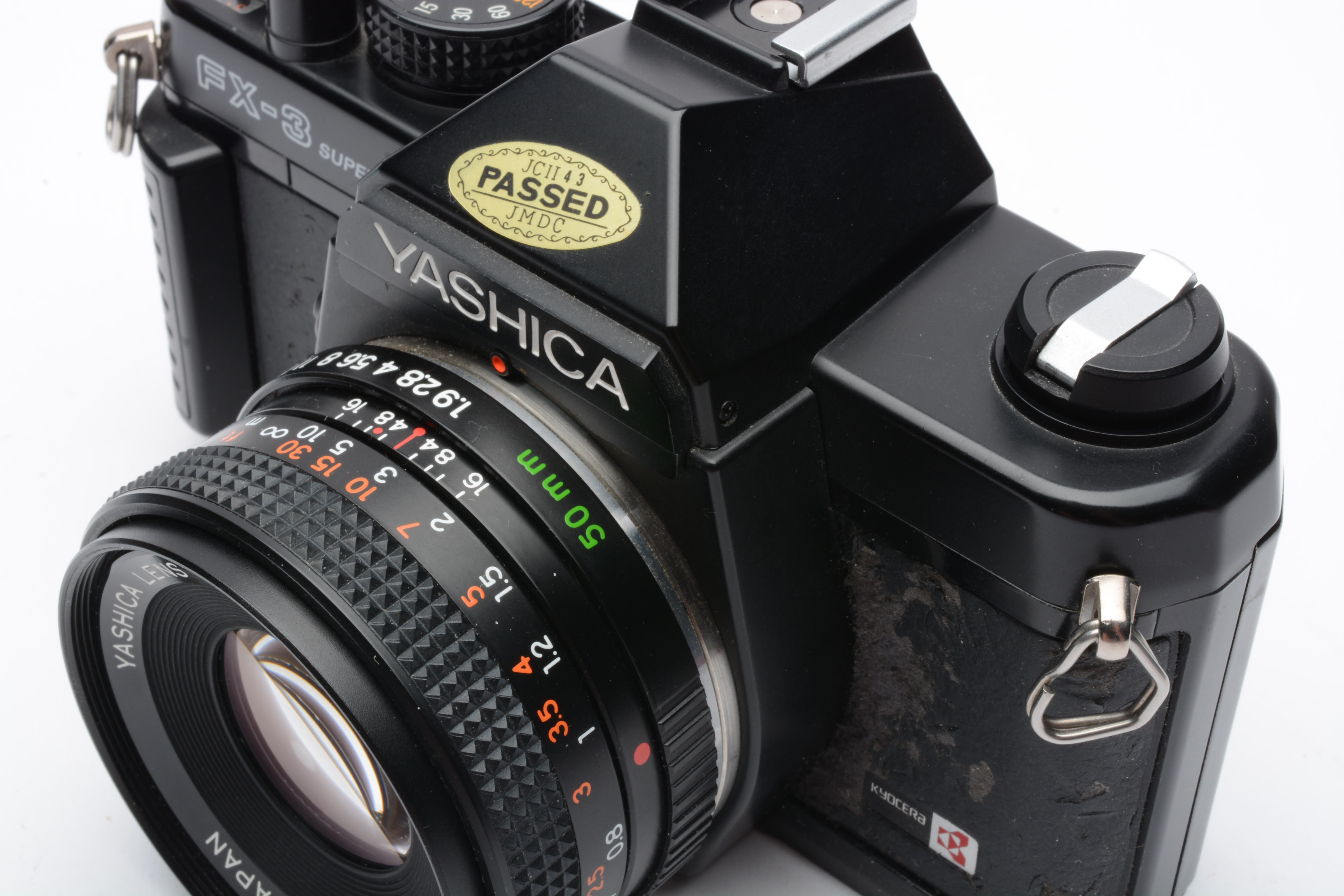 Yashica FX-3 35mm SLR w/50mm F1.9 ML lens, manual, cap, new seals