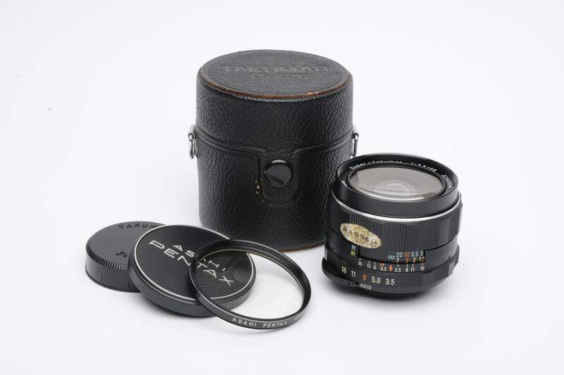 Super Takumar 28mm f3.5 M42 mount lens, caps, case, hood, UV