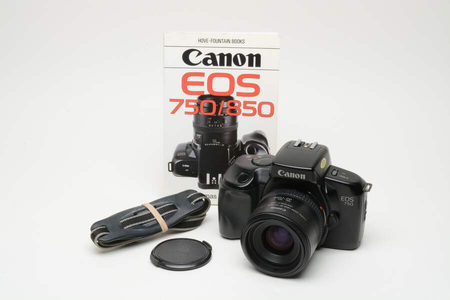 Canon EOS 750 35mm SLR w/35-70mm f3.5-4.5A zoom lens, book