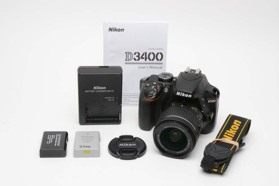 Nikon D3400 DSLR w/18-55mm f/3.5-5.6 Lens, 2batts, charger, manual