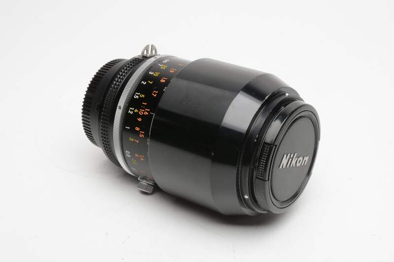 Nikon MF Micro-Nikkor 105mm f2.8 lens w/HS-14 lens hood and caps