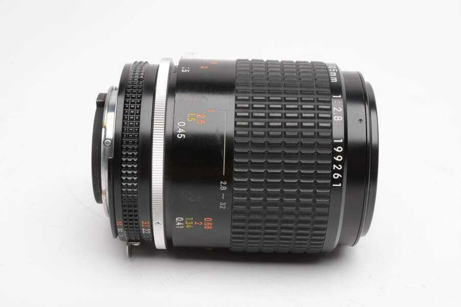 Nikon MF Micro-Nikkor 105mm f2.8 lens w/HS-14 lens hood and caps