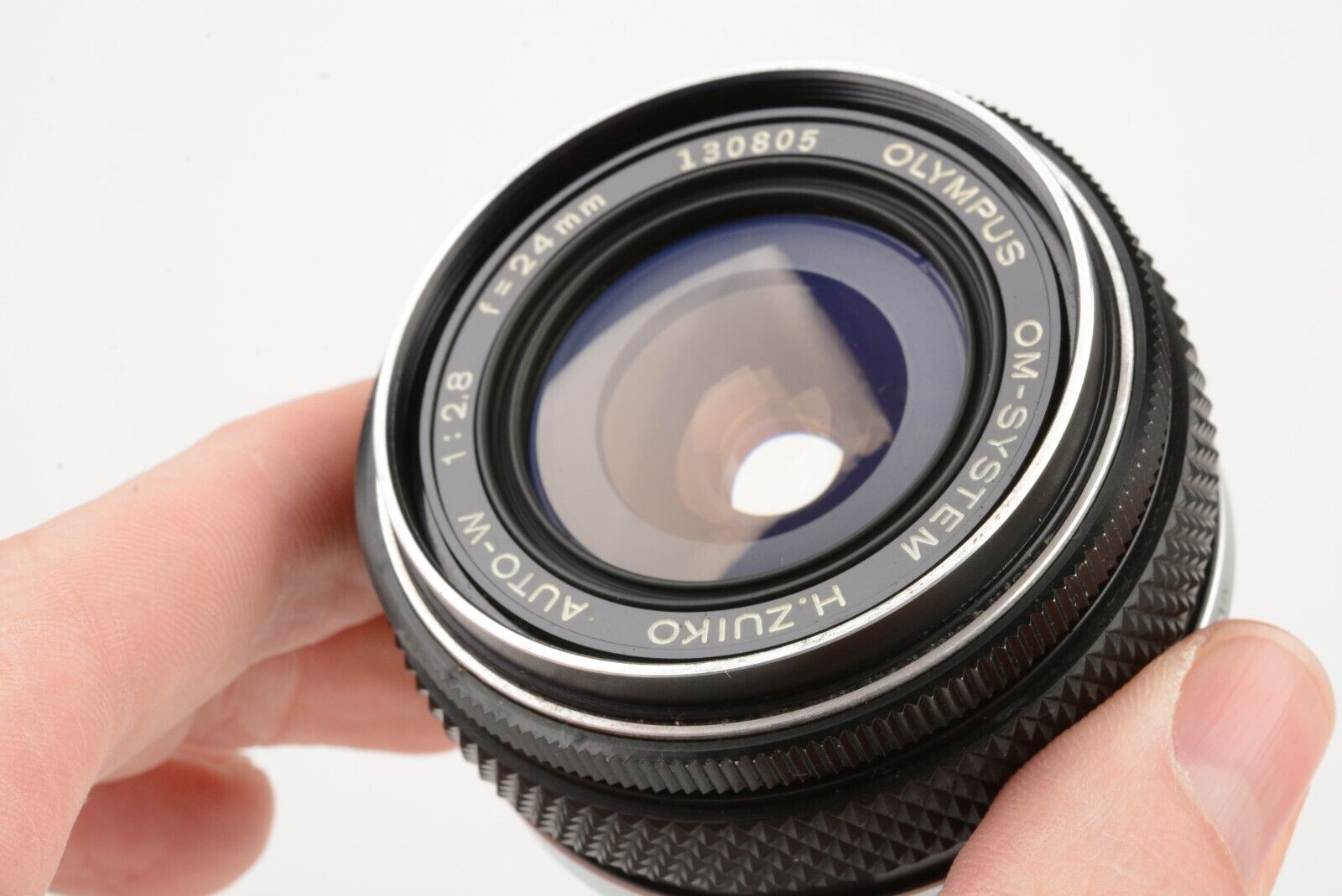 Olympus OM 24mm F2.8 H Zuiko Auto-W Wide Angle Lens, UV + caps | eBay