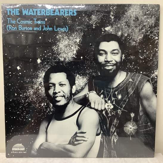The Cosmic Twins–The Waterbearers The Cosmic Twins (Ron Burton and John Lewis) - The Waterbearers