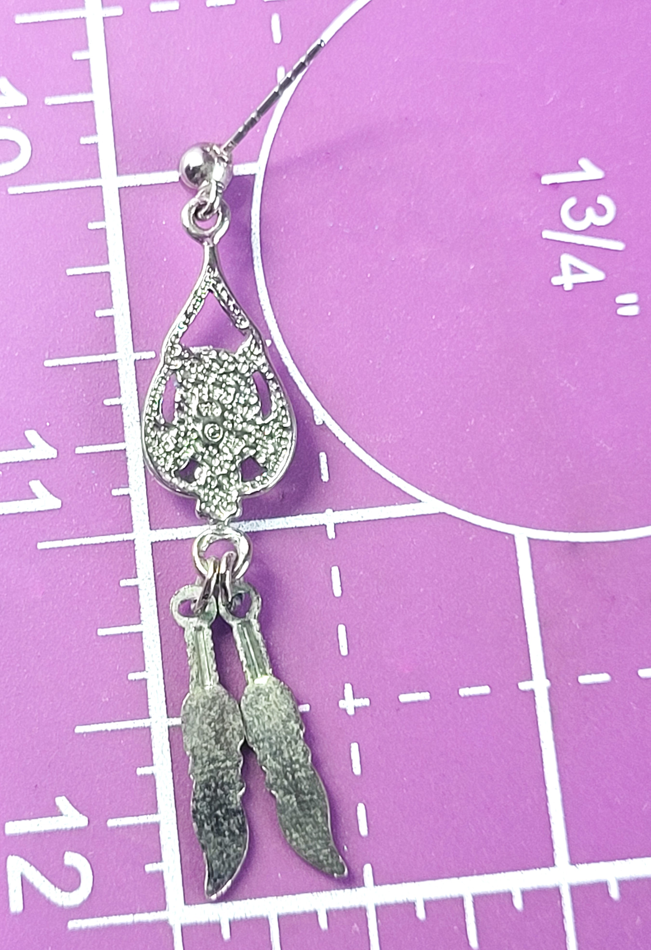 Spiny Oyster Southwestern style sterling silver long drop feather earrings product image view 7
