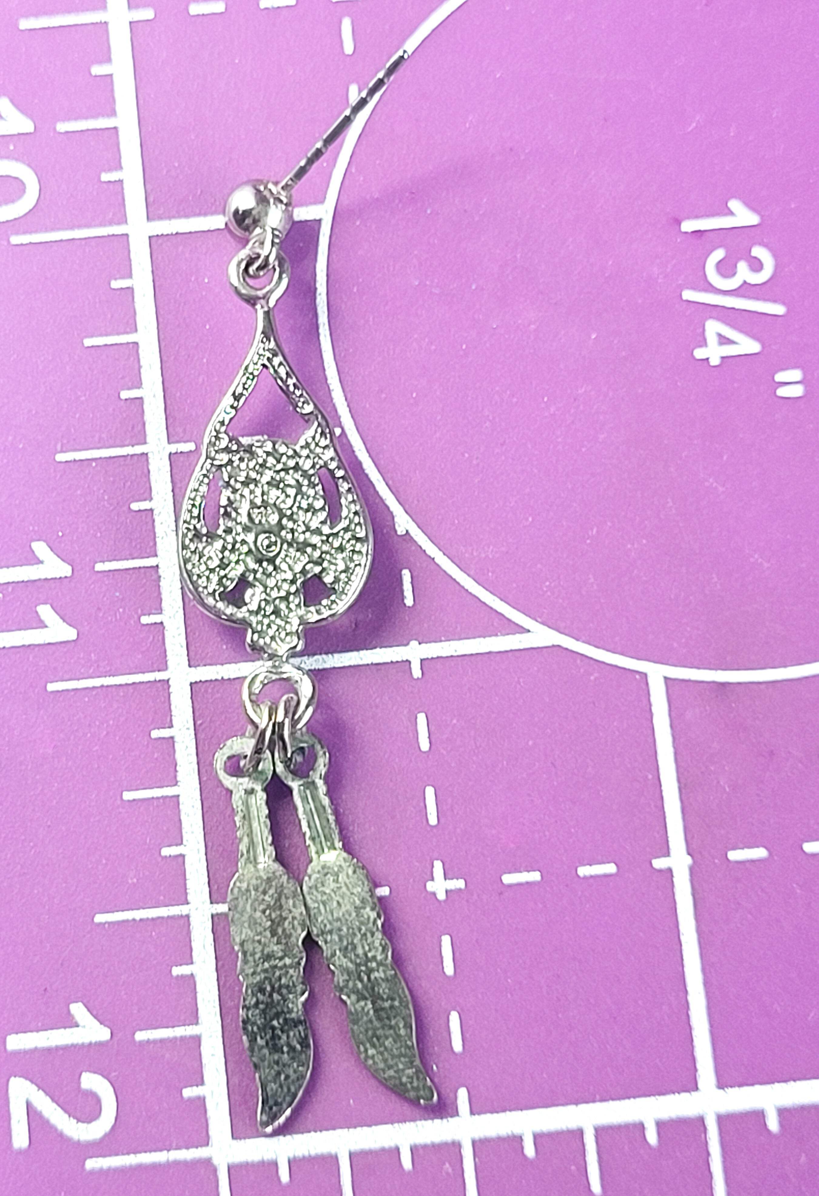 Spiny Oyster Southwestern style sterling silver long drop feather earrings detailed image 7
